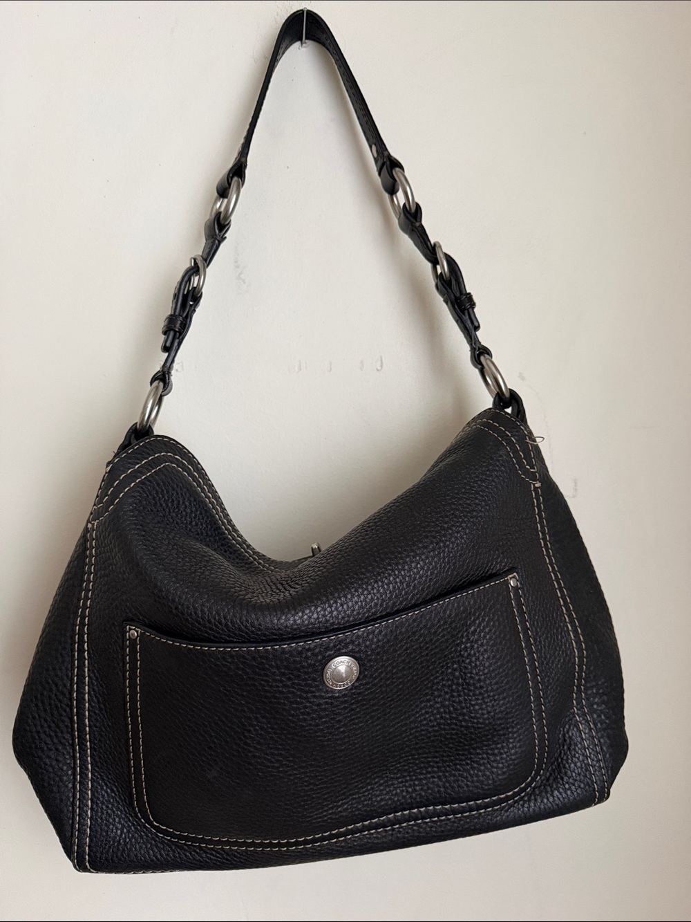 Coach Chelsea hobo shoulder bag crafted from black pebbled leather